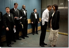 Jan. 20, 2009
“We were on a freight elevator headed to one of the Inaugural Balls. It was quite chilly, so the President removed his tuxedo jacket and put it over the shoulders of his wife. Then they had a semi-private moment as staff member and Secret Service agents tried not to look.”
(Official White House photo by Pete Souza)

This official White House photograph is being made available only for publication by news organizations and/or for personal use printing by the subject(s) of the photograph. The photograph may not be manipulated in any way and may not be used in commercial or political materials, advertisements, emails, products, promotions that in any way suggests approval or endorsement of the President, the First Family, or the White House. 
